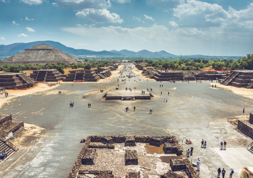 Photo of Teotihuacan plaza, pyramids, and mountains in Mexico