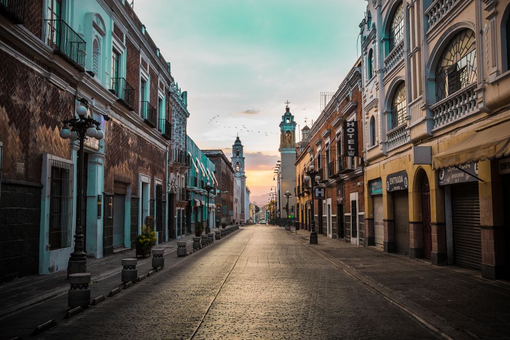 Photo of Colonial-style cobblestone street in Puebla, Mexico