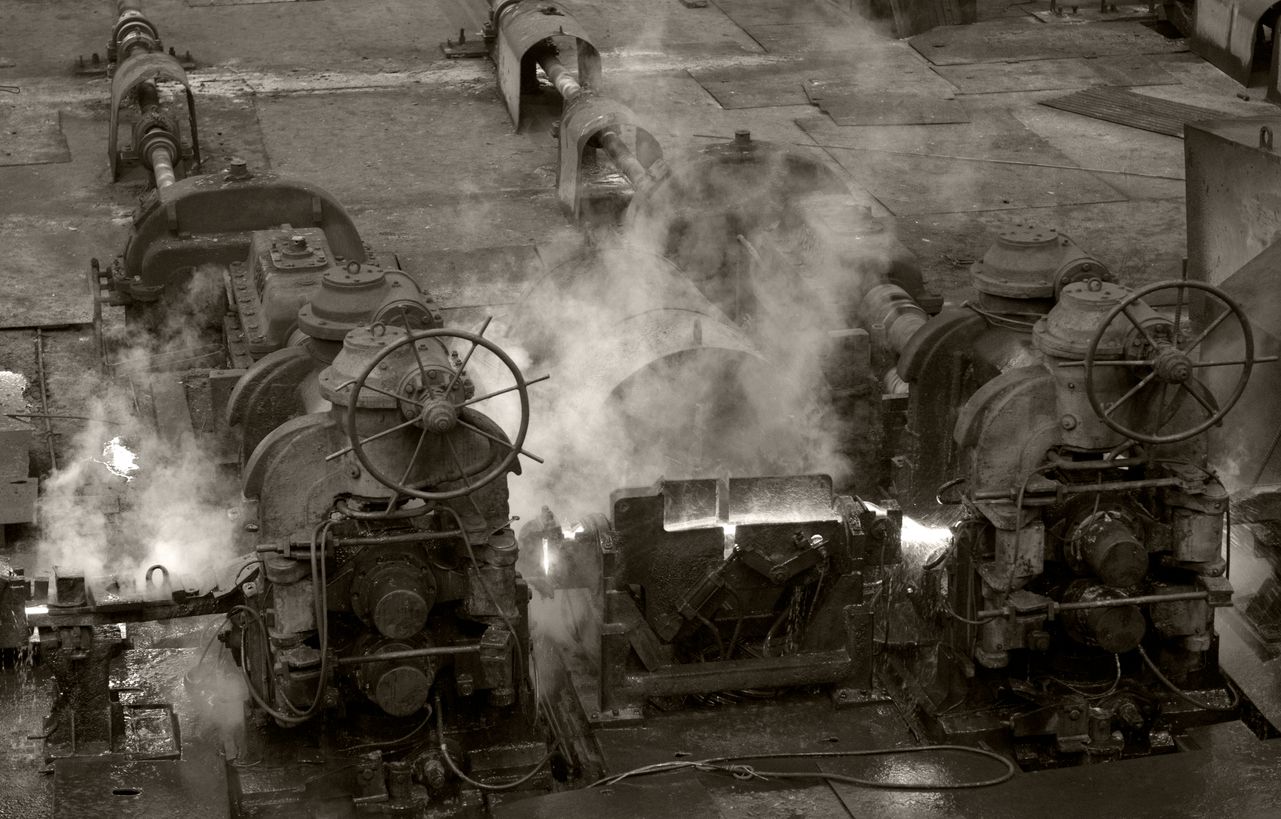 Black and white photo of old steam engines