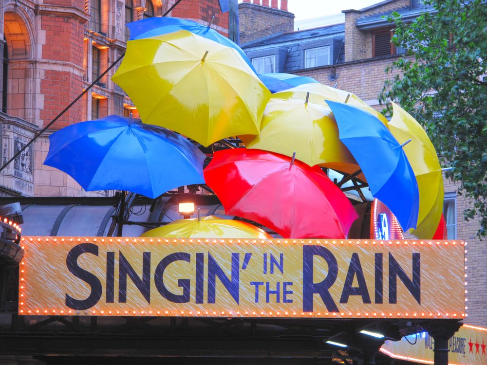 Photo of the Singin in the Rain marquee with decorative umbrellas