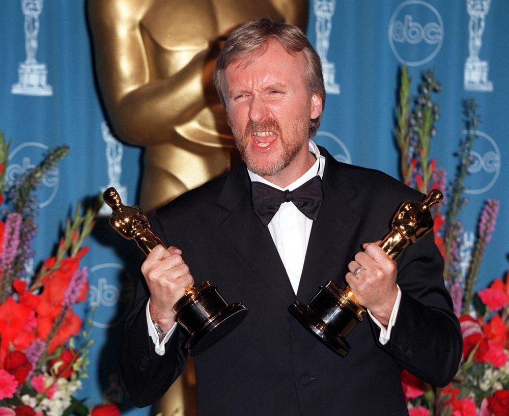 Director James Cameron accepting awards at the 70th Academy Awards, Hollywood, California