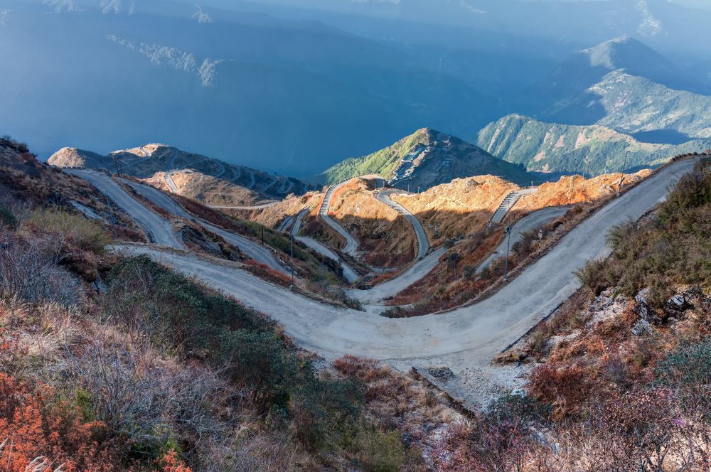 Winding trail of the Silk Road with mountains in the background