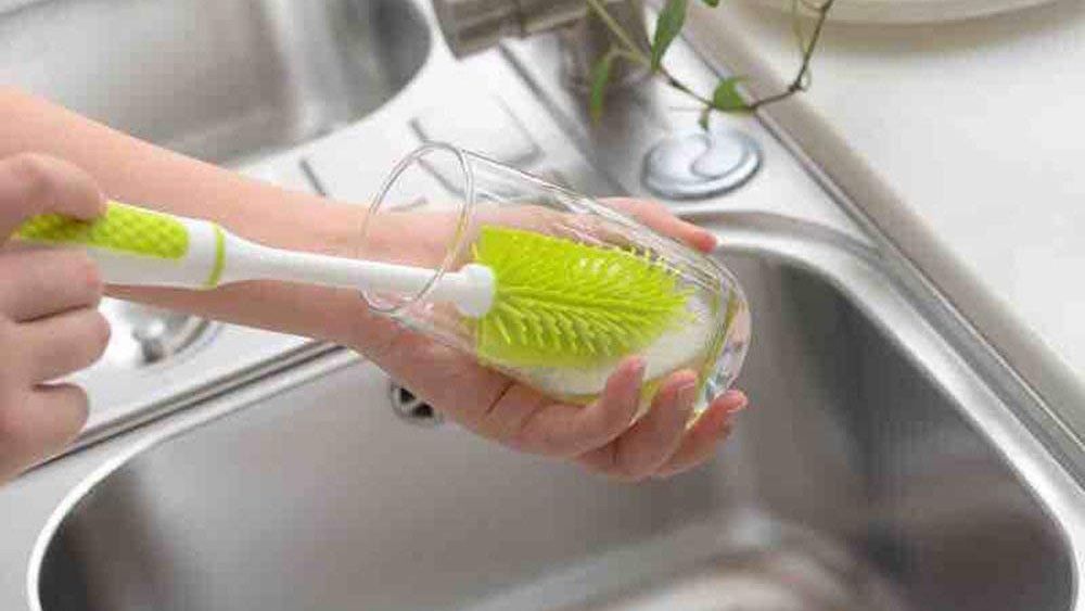 I just realized I can use the silicone tip (left) of this brush to get  stuck food off dishes without picking food out of bristles after! :  r/CleaningTips