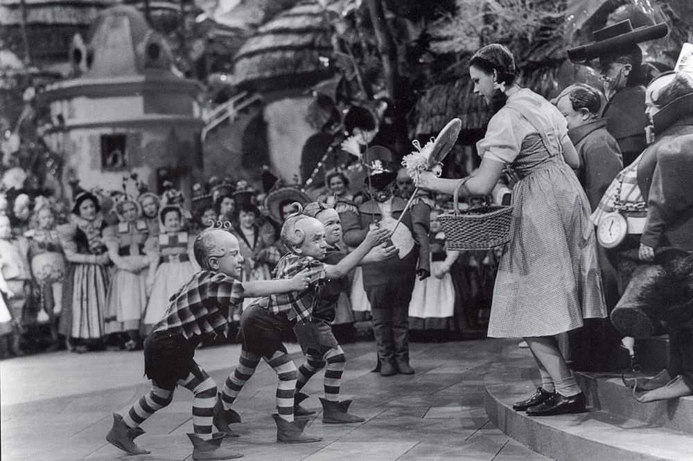 Munchkins with Dorothy in the Wizard of Oz