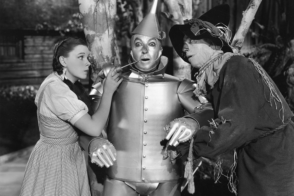 Dorothy of the Wizard of Oz with the Tin Man and the Scarecrow