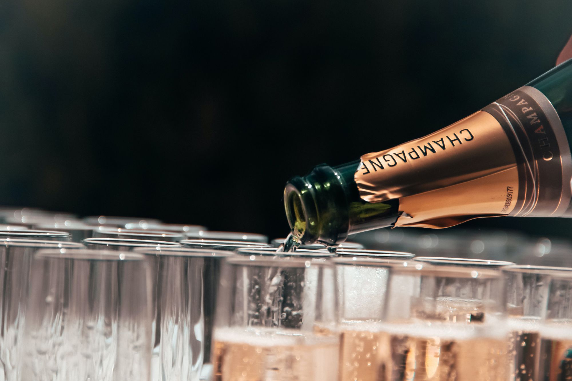Champagne being poured into glasses