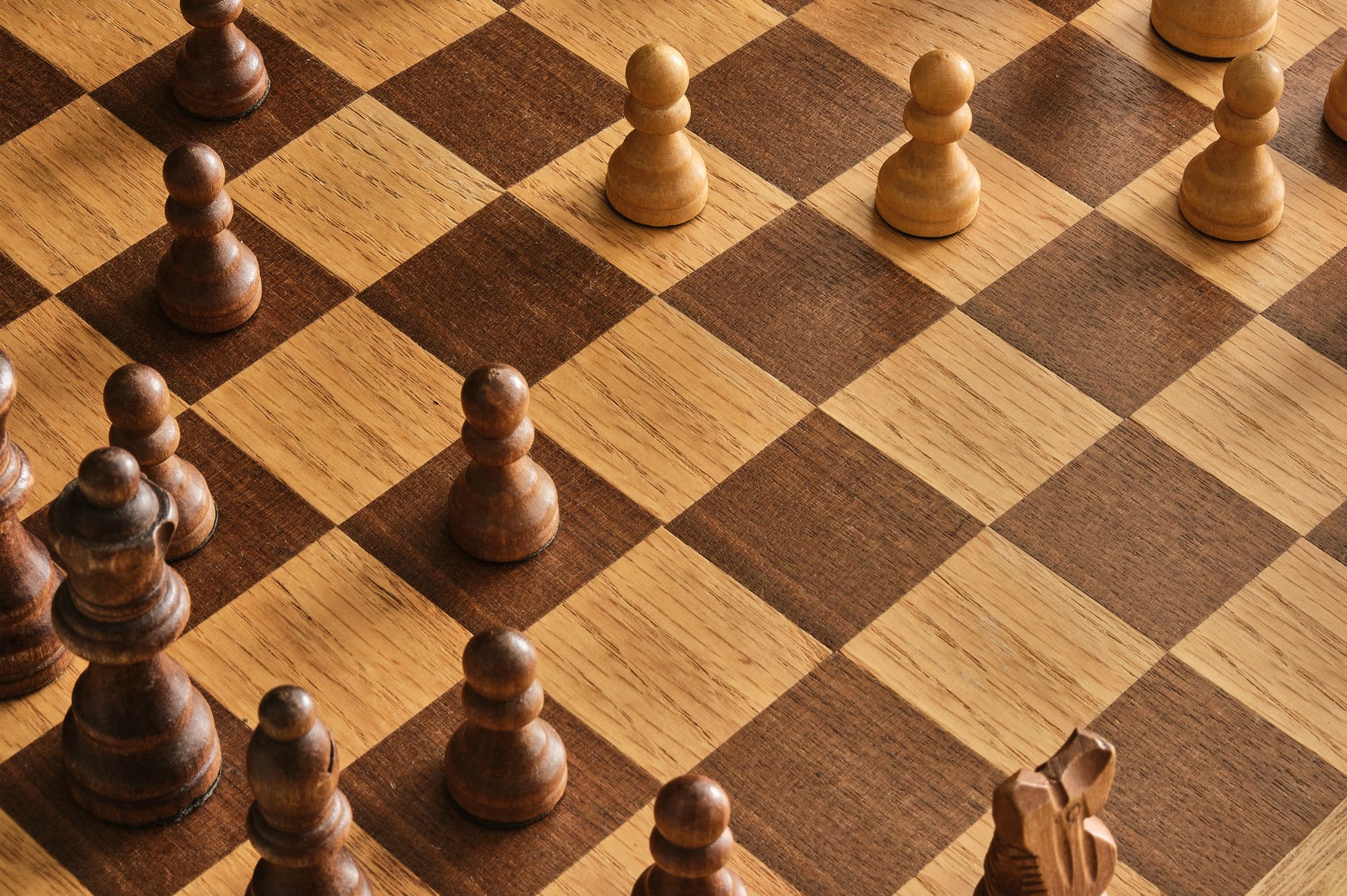 Wooden chess board and chess pieces