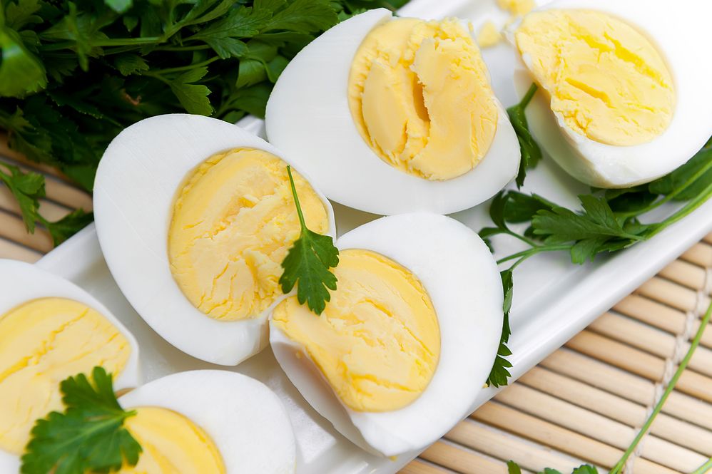 Hard-boiled eggs on a white plate